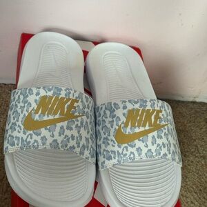 Nike White and Gold Patterned Slides